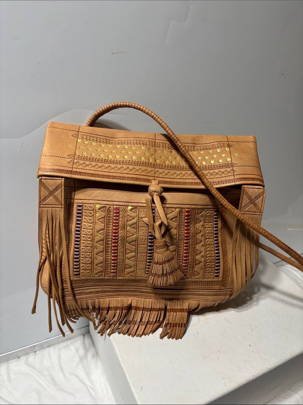 Moroccan handmade foldover leather bag with fringes. NWOT